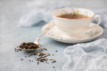 Royal Grafton Fine Bone China Tea Cup and Saucer with Vanilla Chai Tea on Blue Background