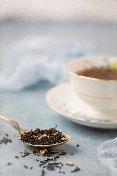 Royal Grafton Fine Bone China Tea Cup And Saucer With Vanilla Chai Tea On Blue Background