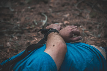 corpse of a man in the woods