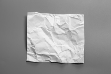 Blank portrait mock-up crumpled paper. brochure magazine isolated on Gray background, changeable background / White paper isolated.