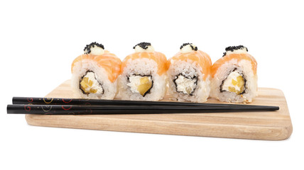 set of sushi roll on a wooden plate, isolated on white close-up