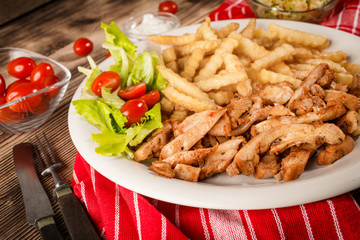 Greek gyros dis with fries and salad