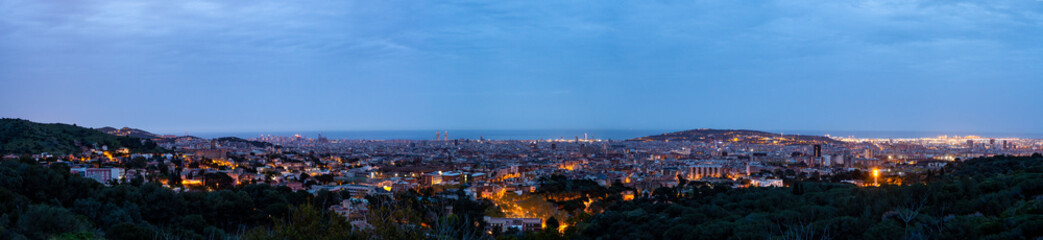 Panorama of Barcelona City, Spain early in the morning just before sunrise