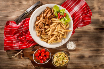Greek gyros dis with fries and salad