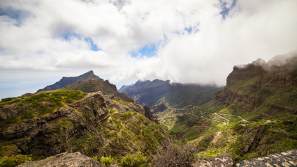 Mountain serpentine. Landscape of the Masca Gorge. Beautiful views of the coast with small villages in Tenerife, Canary Islands