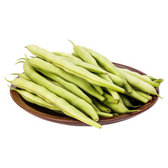 Fresh green beans in a clay plate on a table, white isolated background