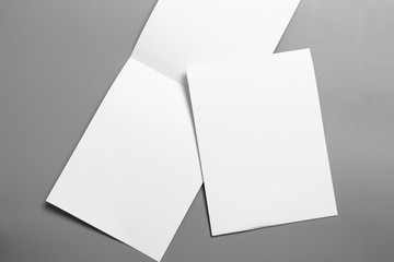 Blank portrait mock-up paper. brochure magazine isolated on gray, changeable background / white paper isolated on gray