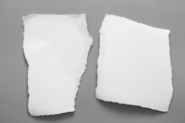 white torn paper on gray background. collection paper rip