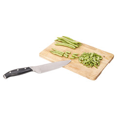 Fresh green beans on a cutting board on a table, white isolated background