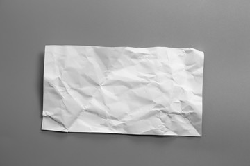 Blank portrait mock-up crumpled paper. brochure magazine isolated on Gray background, changeable...