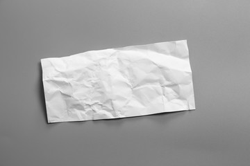 Blank portrait mock-up crumpled paper. brochure magazine isolated on Gray background, changeable...