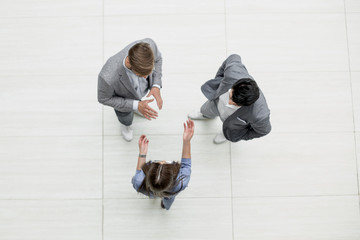 top view.business people discussing problems