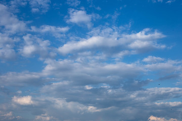 white clouds in the blue sky