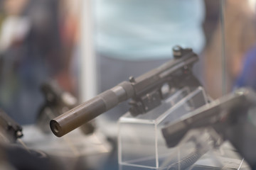special operation handgun with silencer under the glass