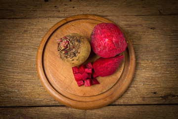 beetroot with on chopping board on wooden