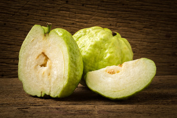 guava fruit on wood