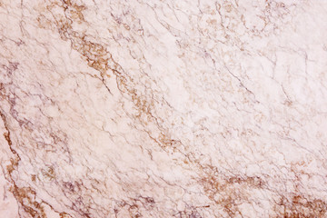 Marble slab with red and brown stains