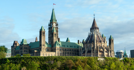Fototapeta na wymiar Parliament Hill - Ottawa, Ontario, Canada. Its Gothic revival suite of buildings is the home of the Parliament of Canada.