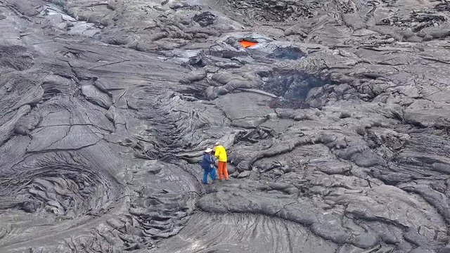 Researchers use precision equipment at the rim of Kilauea Volcano to study magma flow at the lava lake at the Hawaiian Volcano Observatory, Hawaii.