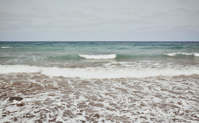 Wonderful seascape. Surf Waves breaking on a seashore. Amazing ocean nature. Front view