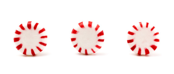 Three Round Peppermints on a White Background