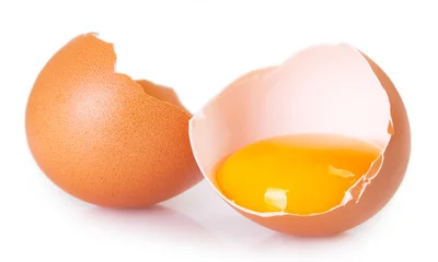 Zelfklevend Fotobehang Raw egg on white background © valery121283