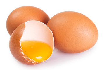 Raw eggs on white background