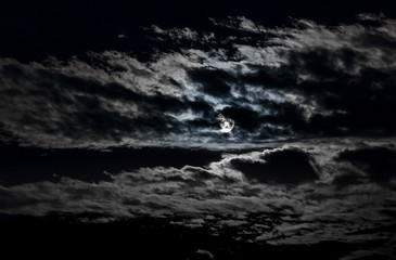 Full moon and the pitch black clouds over the Black sea