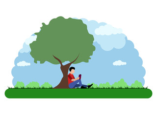 Naklejka premium Landscape of a park with a person reading