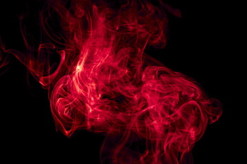 Obraz premium Red smoke on black background
