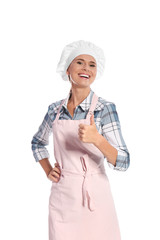 Female chef showing thumb up sign on white background