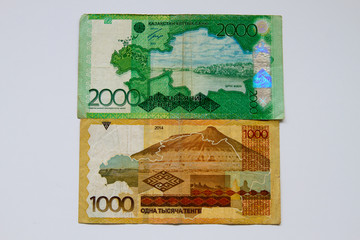 Kazakhstani tenge, banknotes of 1000 and 2000 tenge, the local currency