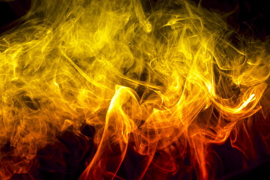 Colored smoke on black background