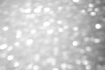 gray blur abstract background. bokeh Christmas blurred beautiful shiny Christmas lights