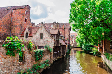 Beautiful canal and traditional houses in the old town of Bruges (Brugge), Belgium