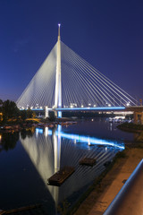 Belgrade Ada Bridge reflection at night
