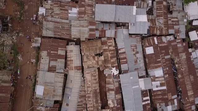 Remarkable aerial shot looking straight down above vast overpopulated slums in Kibera, Nairobi, Kenya, Africa.