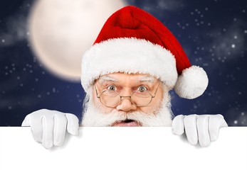 Portrait of Surprised Santa Claus on white background