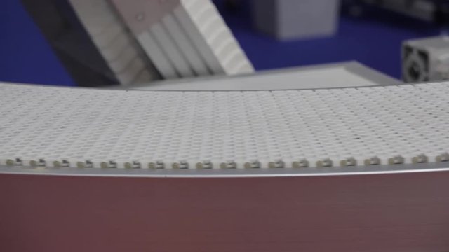 Empty White Plastic Conveyor Belt in Factory