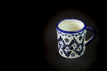 Talavera cup of a black background