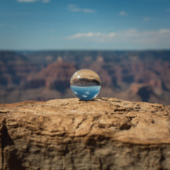 Fototapeta na wymiar Glass Clear Globe on Grand Canyon Rock