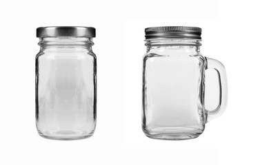 Two empty glass jar isolated on white background.