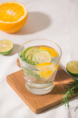 Fresh summer lemonade with citrus, orange and rosemary