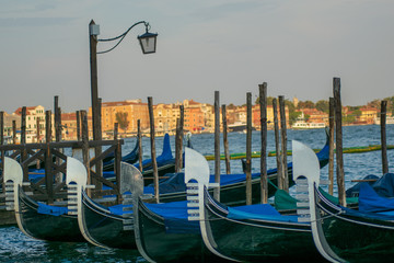 Fototapeta na wymiar View of a some beautiful gondolas in Venice Italy 