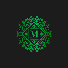 Vector logo design template and emblem made with leaves and letter m eco flowers