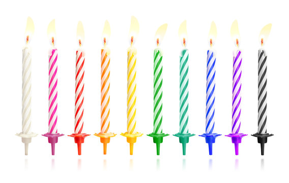 Burning birthday candles isolated on dark background with fire flames. Colorful collection. ( Clipping path )