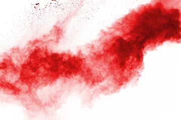 Frieren Sie die Bewegung des explodierenden roten Pulvers ein, isoliert auf weißem Hintergrund. Abstraktes Design der roten Staubwolke. Partikelexplosion Bildschirmschoner, Hintergrundbild © kitsana