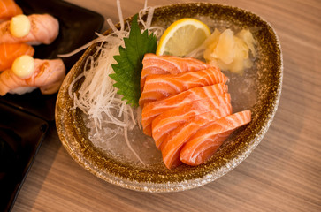 Raw salmon fillet on dish in restaurant,Japanese Food,Close up