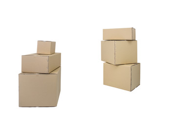 Cardboard Boxes in different sizes stacked boxes isolated on white backgrouns