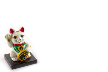 Old Maneki Neko isolated on white background